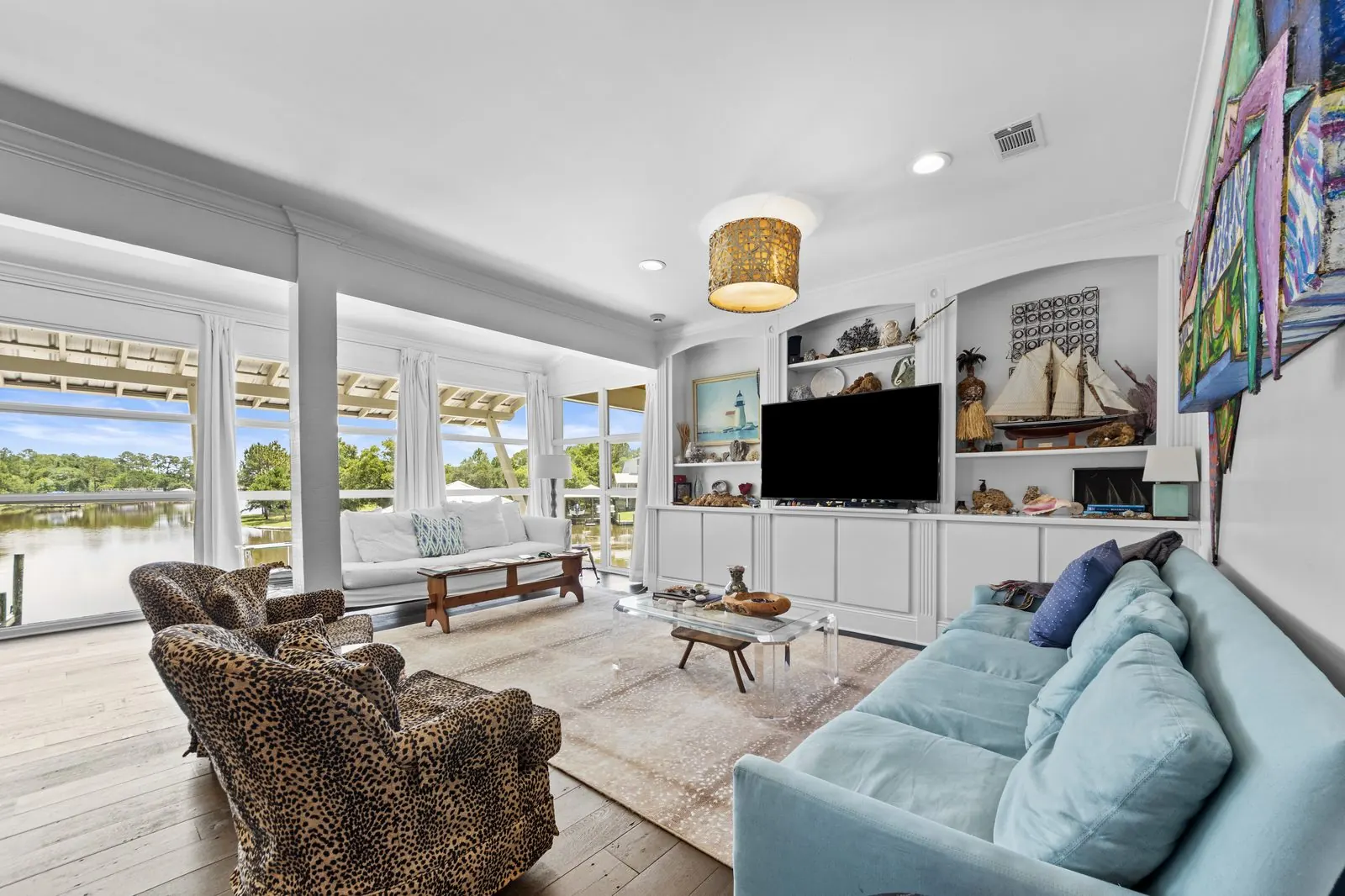 Bright waterfront living room photographed by Jay's Lens